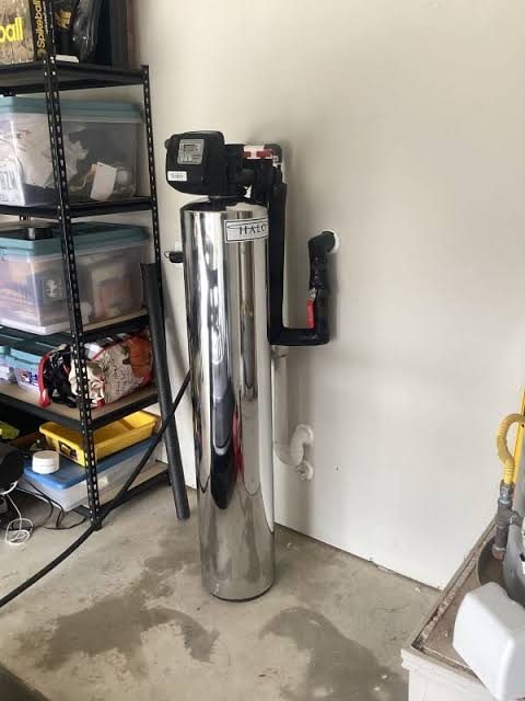 Whole-home filtration system installed in a garage