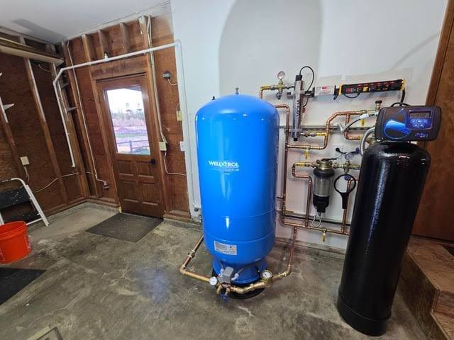 Well pressure tank and water softener at a booked estimate